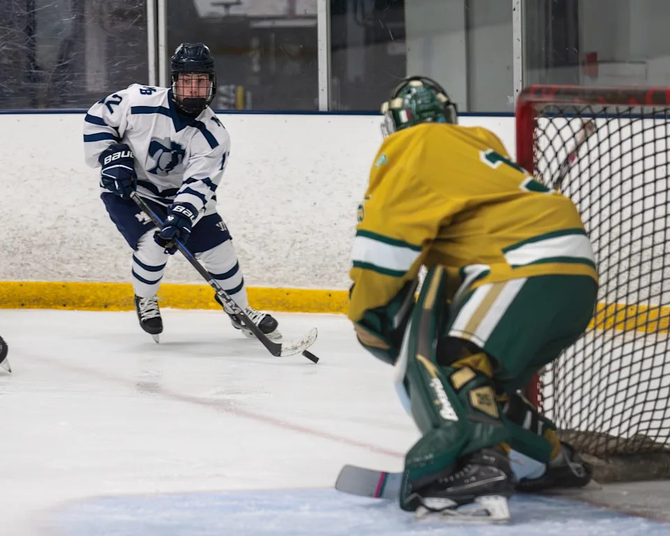 Joseph Magiera (12), Moses Brown, Zachari Fontenault, Hendricken goalie, Jan. 9, 2026